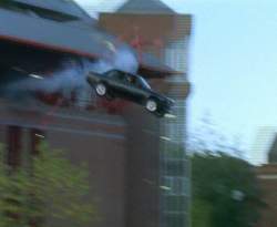 Silberman's car crashes out of the multi-story car park