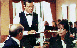 Slade plays waiter to Holly's aunt in the episode Death in the Family